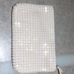 White Wedding type zippered hand held